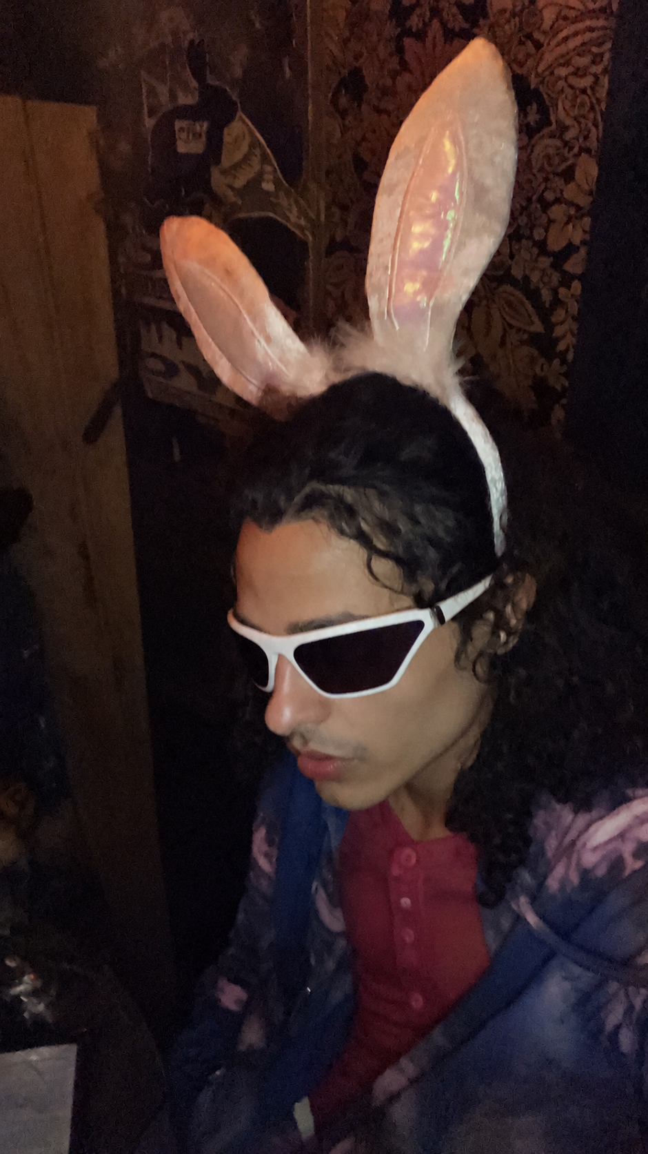 Guest wearing bunny ears at Old Rabbit Club